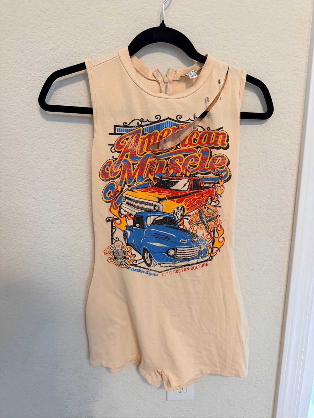 Fashion Nova Cream Graphic Muscle Car Romper with Blue & Red Print